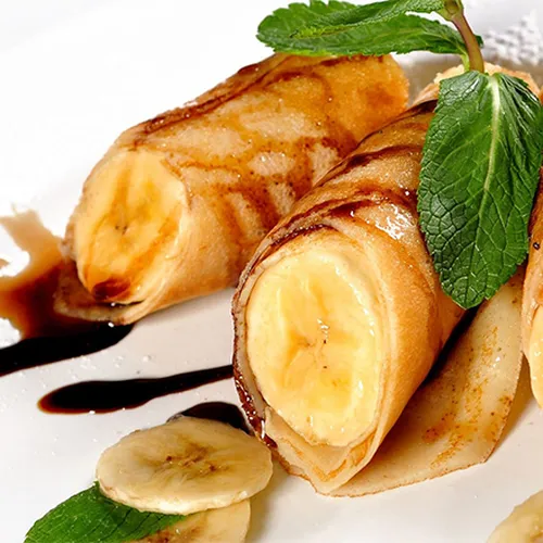 Gebackene Bananen mit Honig und Vanille-Bourbon-Eiskrem